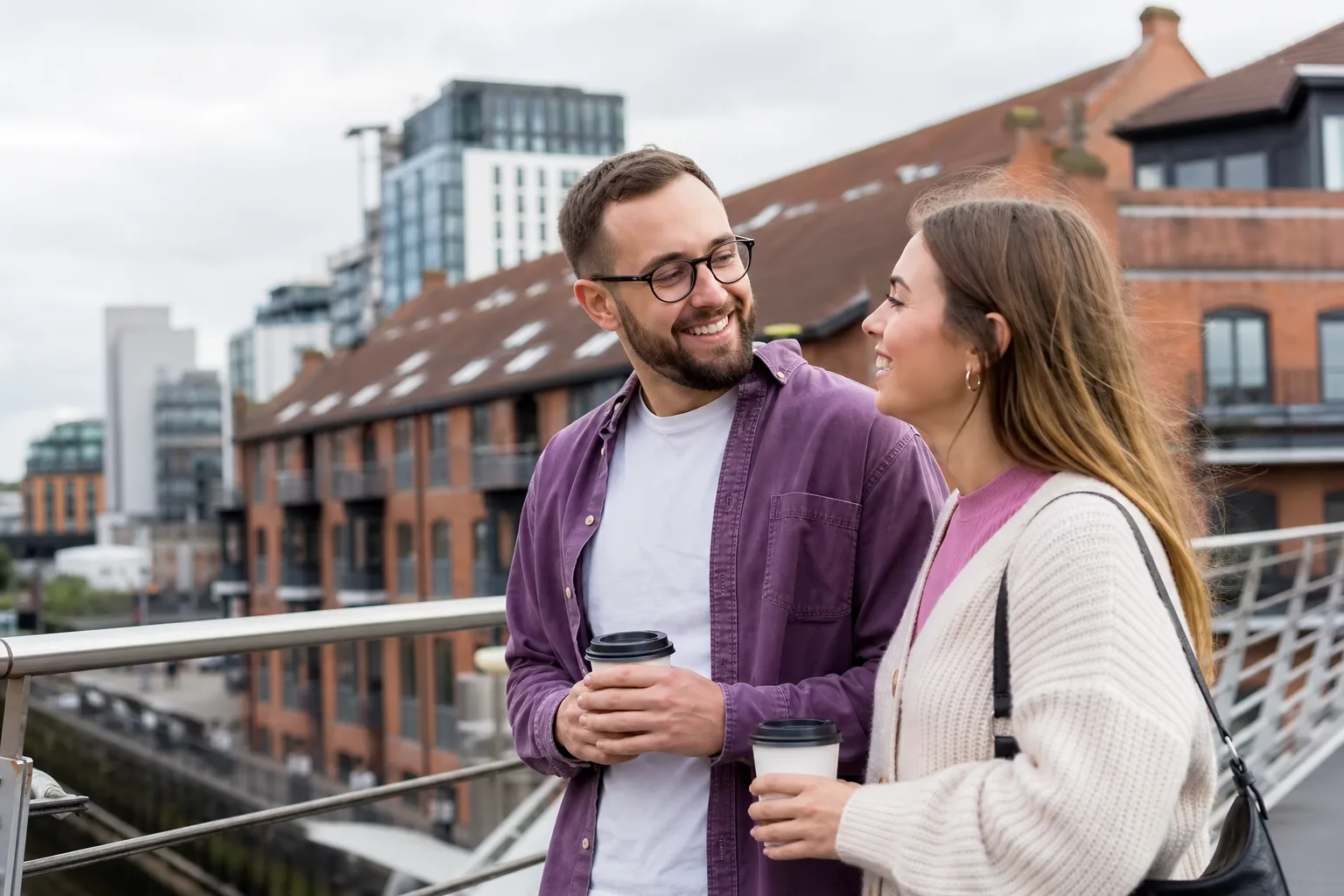 Two people talking over coffee at an independent café in Leeds
