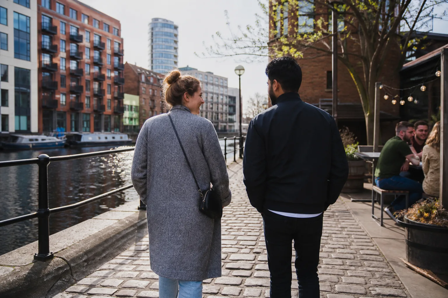 Two people chatting over coffee in Leeds city centre